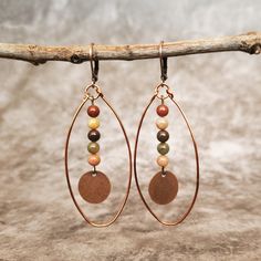 Beautiful handmade copper hoop earrings with tiny red creek jasper heishi beads.  Leverback closure, lightweight, eye-catching boho-style dangles Bohemian Teardrop Copper Hoop Earrings, Bohemian Dangle Hoop Earrings With Copper Wire, Bohemian Hoop Earrings With Copper Wire, Bohemian Small Hoop Copper Earrings, Bohemian Brown Wire Wrapped Hoop Earrings, Bohemian Small Copper Hoop Earrings, Small Bohemian Copper Hoop Earrings, Brown Copper Bohemian Hoop Earrings, Adjustable Nickel-free Rust-colored Jewelry