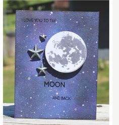 a card with the moon and stars on it