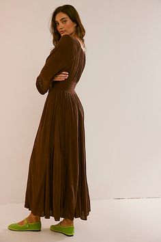 Romantic and ethereal, this sweet maxi from our free-est collection is a true versatile staple. **Fit:** Billowy throughout with cinched waist **Features:** V-neckline, smocked paneling at bodice, exaggerated sleeves, embroidered lace piecing at the skirt **Why We ❤ It:** Timeless with a sleek heel or laid back with simple flats, this style has endless ways to wear. | Dixie Maxi Dress by free-est at Free People in Brown, Size: S Free People Slip Dress, Fall Barn Wedding, Fall Maxi, Exaggerated Sleeves, Fall Wedding Guest Dress, Dresses Casual Fall, Guest Attire, Romantic Outfit, Free People Clothing