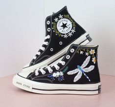 Embroidered converse/Custom converse chuck taylor embroidered Dragonfly and flower/Dragonfly embroidered sneakers/Birthday gift shoes  💸 Price includes Converse Shoes and floral embroidery as shown 🌸 You can send me your Converse/Vans shoes or I can buy them for you. We stock all the Converse and Vans shoes you want, if you want other Converse/Vans shoes in the store, please message us. Your embroidered Converse/Vans shoes will be available for shipping in 7-15 days. 🌸 I started hand embroide Casual High-top Sneakers With Embroidered Graphics, Casual Custom Embroidery Lace-up Sneakers, Multicolor Embroidered Logo Low-top Sneakers, Multicolor Embroidered Low-top Sneakers, Casual High-top Sneakers With Custom Embroidery, Shoe Embroidered, Embroidered Dragonfly, Converse Embroidery, Clothes Painting