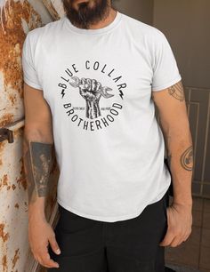 Hey, are you searching for a unique gift for your blue-collar boyfriend or husband? Look no further! The "Blue Collar Brotherhood" tee is the ideal gift for that special skilled laborer in your life. This mechanic-inspired shirt is not just a shirt; it's a statement. Perfect for your husband, boyfriend, or even a coworker, this tee embodies the hard work and dedication of union workers. With a cool design and a meaningful message, this shirt is more than just a piece of clothing - it's a symbol of pride for those who work with their hands. Surprise him with this awesome welder tee and show appreciation for his skilled labor in a thoughtful and stylish way. Made from 100% Airlume combed and ring-spun cotton, offering a premium, soft feel. Features a side-seamed, unisex tailored fit enhancin Hot Blue Collar Men Worker, Support Blue Collar Shirts, Meaningful Messages, Hard Work And Dedication, Piece Of Clothing, Boyfriend Gifts, Halloween Shopping, Cool Designs, Gender Neutral