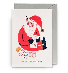 a christmas card with an image of a santa clause holding a cup and playing cards