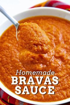 homemade brava's sauce in a bowl with a spoon