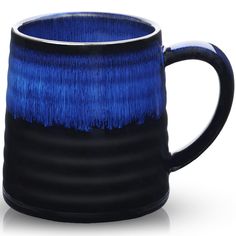 a blue and black coffee mug on a white background