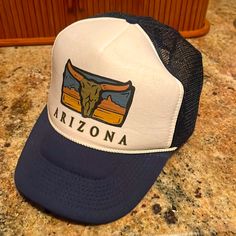 Vintage Trucker Hat From Arizona. Never Worn Blue Retro Vacation Hats, Casual Blue Hats For Rodeo, Western White Snapback Hat, White Western Snapback Hat, White Western Style Snapback Hat, White Retro Hats For Vacation, White Retro Hat For Vacation, Retro Wide Brim Blue Hat, White Retro Vacation Hat