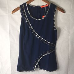 Anthro Lulumari Sleeveless Navy Top Size Small, Beautiful Beaded Detail Nwts Blue Sleeveless Tank Top For Party, Blue Party Vest Top, Chic Blue Tank Vest, Chic Sleeveless Blue Blouse, Chic Blue Sleeveless Tank Top, Elegant Blue Sleeveless Vest, Elegant Blue Vest, Elegant Blue Vest For Party, Babydoll Tank