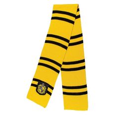 a yellow and black striped scarf with a hogwarts crest on the front side