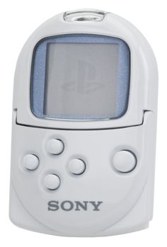 the sony gameboy is white and has buttons on each side, as well as an lcd screen