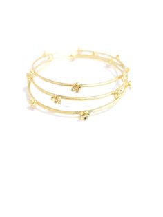 Indulge in luxurious opulence with our GRETA Bracelet. Featuring a Triple Gold Bangles adorned with a delicate Flower Accent, this piece exudes elegance and sophistication. Elevate your style and add a touch of exclusivity to any outfit with this stunning bracelet. Delicate Flower, Elevate Your Style, Gold Bangles, Your Style, Gold Bracelet, Bangles, Bracelet, Christmas, Gold