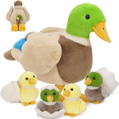 a stuffed duck and her babies are shown