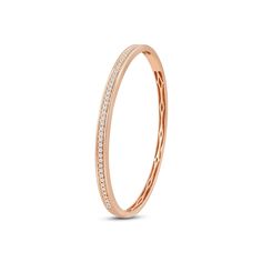 There's power in sparkle. Add this classic bangle to your office ensemble and seal a deal in style. The openable rigid bracelet in yellow gold features a classic diamond pave running along half of the bangle's circumference. This chic piece can easily be paired with almost any of your outfits. Classic Bangles, Gorgeous Engagement Ring, Diamond Bangle, Now And Forever, Match Making, Love Symbols, Conflict Free Diamonds, High Quality Jewelry, Diamond Gemstone