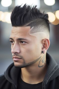 We have the low fade with a fohawk (faux hawk) – an adventurous choice for those who want to step outside their comfort zone. By combining a mohawk with a low fade taper, this hairstyle offers both edginess and versatility. Click here to check out more handsome low taper fade haircuts for men. Faux Hawk Hairstyles, Taper Fade, Taper Fade Haircut, Long To Short Hair, Edgy Haircuts