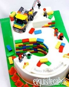 a birthday cake with legos on it