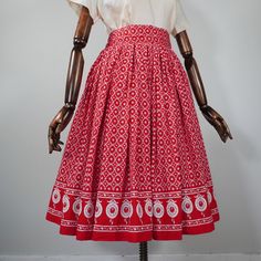 "Condition: Excellent   Color: Red, white pattern   Label: No Label Present   Fits like: Modern Extra Extra Small - Extra Small  Description:  Adorable true vintage 1950s circle skirt featuring a heart and leaf pattern throughout. Around the hem there are two love birds kissing on top of a clock. How cute! One of a kind vintage piece. The skirt is fastened on the side with snap buttons on the side. The belt is removable and is just wrapped around (no belt loops).   Skirt is It is not sold with the blouse and petticoat as paired in the photos. Measurements: SKIRT: Waist: 11.5\" - 12\" No more room Hips: Open\" Length: 29\" BELT: Length: 53\" Width: 5\" --TERMS AND CONDITIONS: Each item is wrapped in acid free tissue paper to preserve and protect the garment/ item. Items are processed and sh Birds Kissing, 1950s Circle Skirt, Crazy Jewelry, Half Circle Skirt, Two Love Birds, Weird Jewelry, Half Circle, Mode Vintage, Circle Skirt