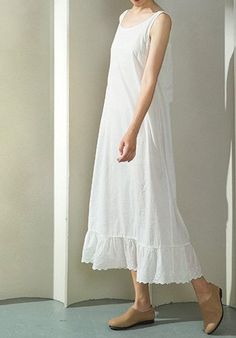 "100% Premium quality cotton slip, cling free, soft, comfortable and no itch. An exquisite accessory for your wardrobe, this soft and light slip can be worn to layer under any sheer caftans, tunics, dresses (as shown in the picture), traveling, and just as a lovely night dress at home. -100% cotton -Ankle length -Eyelet hem -Slightly A-line shaped -The last two pictures are for reference of the slip's length underneath a maxi dress. Please provide your full bust measurement ( measured around the White Cotton Slip Dress, Comfortable Cotton Nightgown For Spring, Summer Home Dresses With Spaghetti Straps, Casual Cotton Nightgown For Summer, Casual Cotton Nightgown With Lace Trim, Elegant Cotton Sleepwear For Spring, Spaghetti Strap Nightgown For Summer Daywear, Summer Daywear Nightgown With Spaghetti Straps, Summer Cotton Nightgown For Sleep