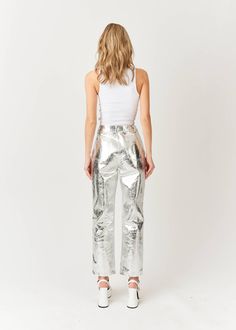 High-end glam has arrived. The Lupe Metallic Textured Pant by Amy Lynn has entered the chat. High waist faux leather trousers in an iridescent crunchy textured metallic finish. Straight leg fit. Non-stretch. Structured waistband with belt loops and 5 functional pockets. Exposed button and concealed zip-fly fastening. These are a luxe brand and do run a touch small. Size Small fits 0-2, Medium fits 4-6, Large fits 8 - S: side seam length:40.5 inches, inside seam length: 29.3 inches, waist:27 inch Silver Metallic Pants, Silver Trousers, Metallic Trousers, Textured Pants, Faux Leather Trousers, Green Beaded Bracelets, Metallic Pants, Pants Large, Leather Trousers