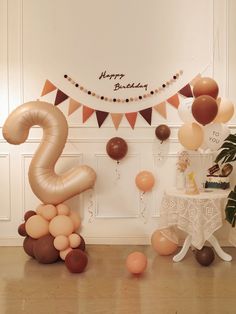 a birthday party with balloons and decorations