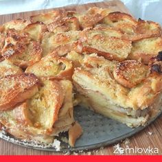 there is a pie that has been cut in half on the plate and ready to be eaten