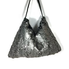 "Silver Faux Fur Hobo Bag Silver Hobo Bag Silver Faux Fur Shoulder Bag Faux Fur Purse Black and Silver Vegan Fur Purse Vegan Fur Handbag High end...high quality...so soft...highly unique silver faux fur hobo bag Fully-lined in black cotton quilted fabric Interior pockets, center magnetic closure Great for work, workout, play or travel Approximate Measurements: 20\" wide across the bottom 14\" high ...so chic...punk...goth...fits many different styles STRAPS Same faux fur as bag, 17\" drop only ( Goth Fits, Fur Handbag, Sequin Hat, Lace Inspiration, Faux Fur Purse, Faux Fur Bag, Lace Bag, Fur Purse, Fur Handbags