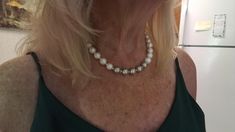 A beautiful pearl necklace of white Medium size pearls with five champagne color ones in center showing off the glistening beauty of this necklace. It's 17 inches with a pretty silver toggle closure. This necklace will be a beautiful bridesmaid or maid of honor gift, and she will think of your special day  whenever she wears it. also a great choice for a birthday vacation or a special day. This necklace is versatile and pearls  are always the right choice. Whether worn  with a formal gown,classi