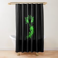 a black shower curtain with a green dinosaur on it