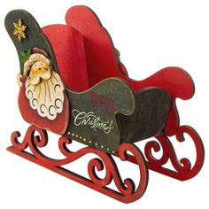 a wooden sleigh with santa claus on it