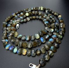 Natural Labradorite Faceted Nugget Beads Oval Shape Top Quality Wholesale PriceDetail Stone------Labradorite   Product--- Faceted Nugget Beads Shape----- Oval Size-------- 9x8.MM Approx Quantity--- 1.StrandYour Feedback is of prime importance for us and if it is positive, it would be much appreciable if you are unhappy with our product and service, please reach to us privately before leaving the negative neutral feedback to resolve the issue. Thank you Fancy Beads, Black Opal, Faceted Bead, Ethiopian Opal, Oval Shape, Turquoise Bracelet, Labradorite, Opal, Beaded Necklace