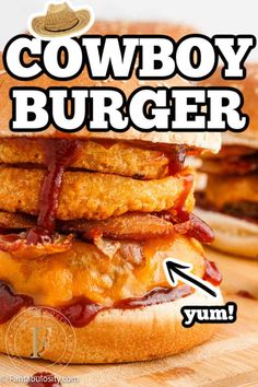 the cowboy burger has bacon on it and is ready to be eaten by someone else