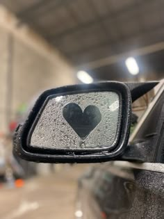 the rear view mirror has a heart on it