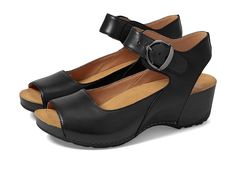 Dansko Tiana - Women's Shoes : Black : Tiana is the perfect heeled sandal to add to any spring wardrobe. Classic styling and premium comfort are created with a sleek ankle and forefoot strap for style that fits. Easy to dress up and comfortable enough to last all day, Tiana is a warm-weather essential. Leather wedge sandals feature full grain leather upper in a stylish, comfortable silhouette. Chrome-free leather linings and Dri-lex Energy Power Mesh lining with energy return with Aegis Shield o Aegis Shield, Energy Power, Perfect Heels, Wardrobe Classic, Black Shoes Women, Heeled Sandal, Leather Wedge Sandals, Open Toe Sandals, Spring Wardrobe