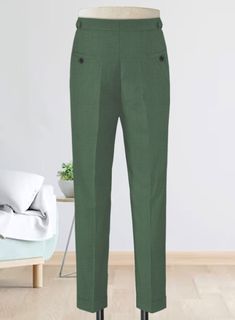 Fuse style and substance effortlessly with these unique-hued trousers. The Napolean Moss Green Wool Highland Trousers are elegant and exude a polished all-purpose look. Crafted from a wool blend, these trousers are stylishly designed from the finest wool fabric.   
  Look Includes    Napolean     Moss     Green     Wool  Fabric  Cross Pocket  Forward 2 Pleats  Side Tabs (No Loops)- Arrow Shape  Bottom Cuff (1.5")  Two Welted Back Pockets on Trousers    Click 'Customize Now' to modify the look i Blue Linen Suit, Blue Tweed Jacket, Black Tuxedo Suit, Grey Wool Suit, Fabric Cross, Casual Office Wear, Scottish Fashion, White Herringbone, Blue Chinos