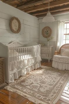 a white crib and chair in a room with wood flooring on the walls