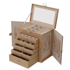 an open jewelry box with several drawers