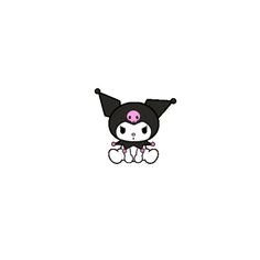 a black and pink cat sitting on top of a white wall