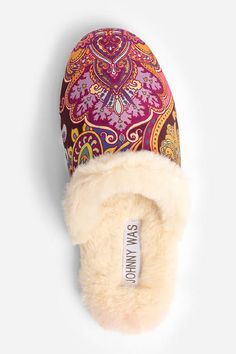 Carefully crafted for cozy comfort, the Sandalwood Pink Mule Slippers are elevated loungewear. Lined with ivory faux fur, these unique slippers are finished with vibrantly detailed jacquard at the toe for a bold accent. Pair with soft pajamas and a silk robe for an enjoyable evening in. Johnny Was Women's Sandalwood Pink Mule Slipper, Size 8 Unique Slippers, Elevated Loungewear, Silk Slippers, Embroidered Slippers, Pink Mules, Soft Pajamas, Silk Robe, Women's Blouses, Embroidered Jeans