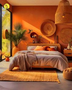 a bedroom with orange walls and wicker furniture