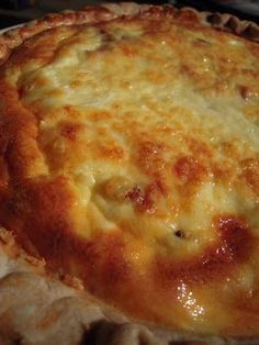 a cheese pie sitting on top of a table