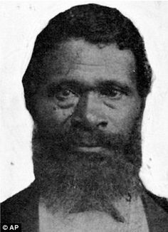 an old black and white photo of a man with a beard