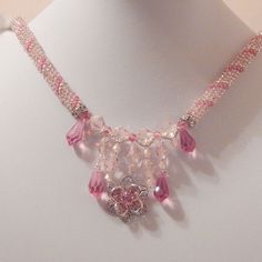 Sterling silver and Swarovski pink crystals, rope style necklace of pink and clear Czech glass with silver embellishments