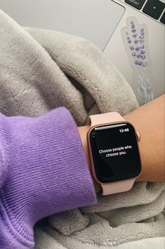 an apple watch on someone's wrist with the quote choose between who you are