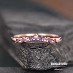 Amethyst Wedding Band Rose Gold Pearl Matching Band Custom Made Curved V Shaped Chevron Stack Ring Delicate February Birthstone Band Straight style: https://www.etsy.com/listing/802666186 To see other curved wedding band: https://www.etsy.com/listing/527716406 https://www.etsy.com/listing/547266926 ITEM INFORMATION Metal Type - Solid 14k Rose Gold Width- (Approx. 1.4mm) Side Stone -Natural Pearl & Natural Amethyst Weight - 0.25ct **Stone Replacement** Available with any other gemstones, plea Dainty Amethyst Wedding Ring, Dainty Purple Amethyst Ring For Wedding, Dainty Purple Amethyst Wedding Ring, Dainty Rose Gold Amethyst Wedding Ring, Dainty Purple Wedding Ring, Delicate Purple Jewelry For Wedding, Delicate Amethyst Wedding Ring, Elegant Pink Amethyst Wedding Ring, Pink Amethyst Jewelry For Wedding