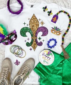 Introducing our Faux Sequin Fleur De Lis Graphic Tee – a stunning Mardi Gras-inspired shirt that captures the essence of celebration and adds a touch of glamour to your wardrobe. This unique graphic tee features a Fleur De Lis design adorned with faux sequins, offering the appearance of real sequins without the physical texture or shine.
Perfect for Mardi Gras festivities, representing New Orleans, Mobile, or simply showcasing your love for the Fleur De Lis, this tee combines style with comfort. The faux sequins create a dazzling effect, providing a visual treat reminiscent of the festive spirit of Mardi Gras.
Crafted for both style and ease, our Faux Sequin Fleur De Lis Graphic Tee ensures a comfortable fit for wear during parades, parties, or casual outings. The absence of actual s Mardi Gras Shirts, Mardi Gras Shirt, The Chic, Mardi Gras, New Orleans, Graphic Tee, Comfort Fit, Essence, Graphic Tees