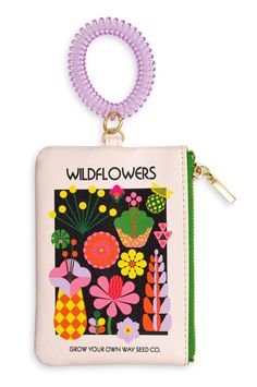 a small purse with flowers on it and a keychain hanging from the front