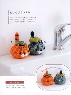 three crocheted pumpkins sitting on top of a white sink next to a faucet