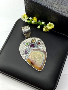 "ARTISAN RAINBOW DRUZY PENDANT Hand-made Sterling Silver 925. Stones used: Rainbow Druzy, Pink Tourmaline, Citrine, Green Sapphire, Garnet, Amethyst.. Height -2 9/16\" (including bail), Width - 1 1/16\" Height - 65mm (including bail), Width - 34mm Unique Handcrafted One-of a-kind Design Pendant Each Piece of Jewelry in my Collection is Absolutely One of a Kind! When you start wearing a piece of my jewelry you will fall in love with it more and more each day and feel that good Energy and Love tha Artisan Jewelry With Stones As A Gift, Multicolor Stone Setting Jewelry Gift, Multicolor Jewelry With Stone Setting For Gift, Multicolor Stone Setting Jewelry For Gifts, Multi-stone Pendant Gemstones For Jewelry Making, Handmade Teardrop Sterling Silver Gemstones, Handmade Sterling Silver Teardrop Gemstones, Handmade Multicolor Gemstones Gift, Traditional Multi-stone Gemstones For Gifts