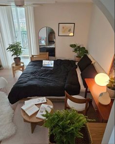 a bedroom with a bed, desk and chair in it's centerpieces