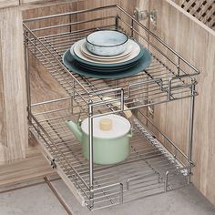 a metal shelf with plates and cups on it