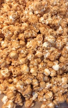 a pile of popcorn sitting on top of a table