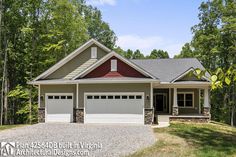 a house in the woods with two garages