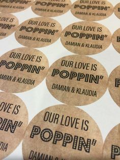 some type of stickers that are on top of a sheet of paper with the words love is popin'in it